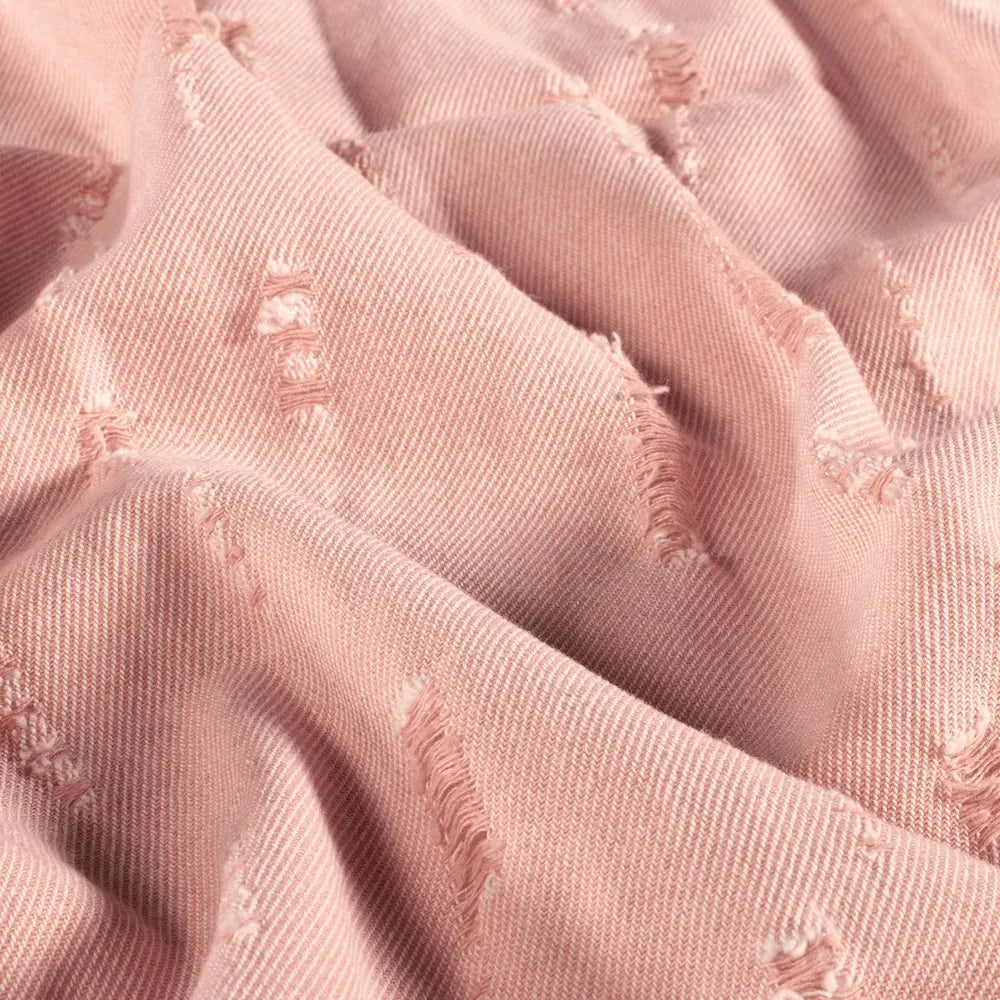 Rosa Jeansstoff in Destroyed Optik aus Baumwoll-Polyester-Mischung als robuste Meterware mit Used Look