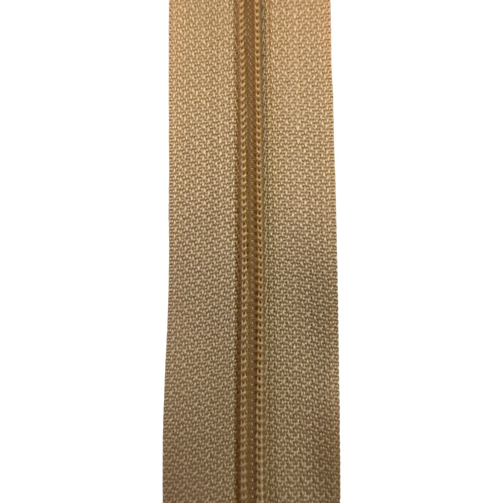 Endlos Spiralreißverschluss 4,2 mm PR0 als Meterware aufgerollt in beige, mit sichtbarer Spirale