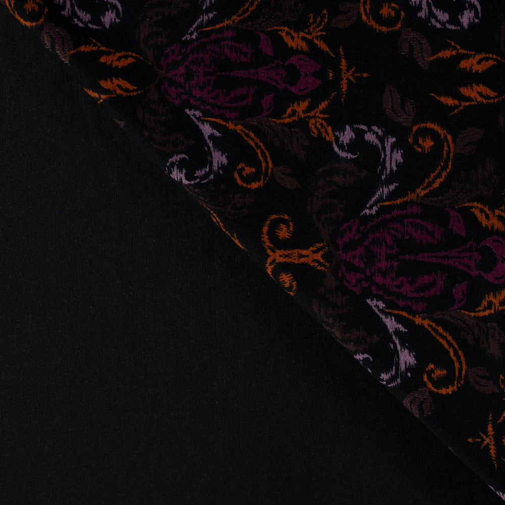 Punta di Roma Stoff mit Ornamenten in Schwarz, Fuchsia, Violett und Rost
